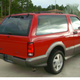 Illustration for article titled Used Car Face Off: Outrageous American Performance SUVs